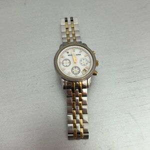 Silver and gold watch. Good condition. Needs new battery.